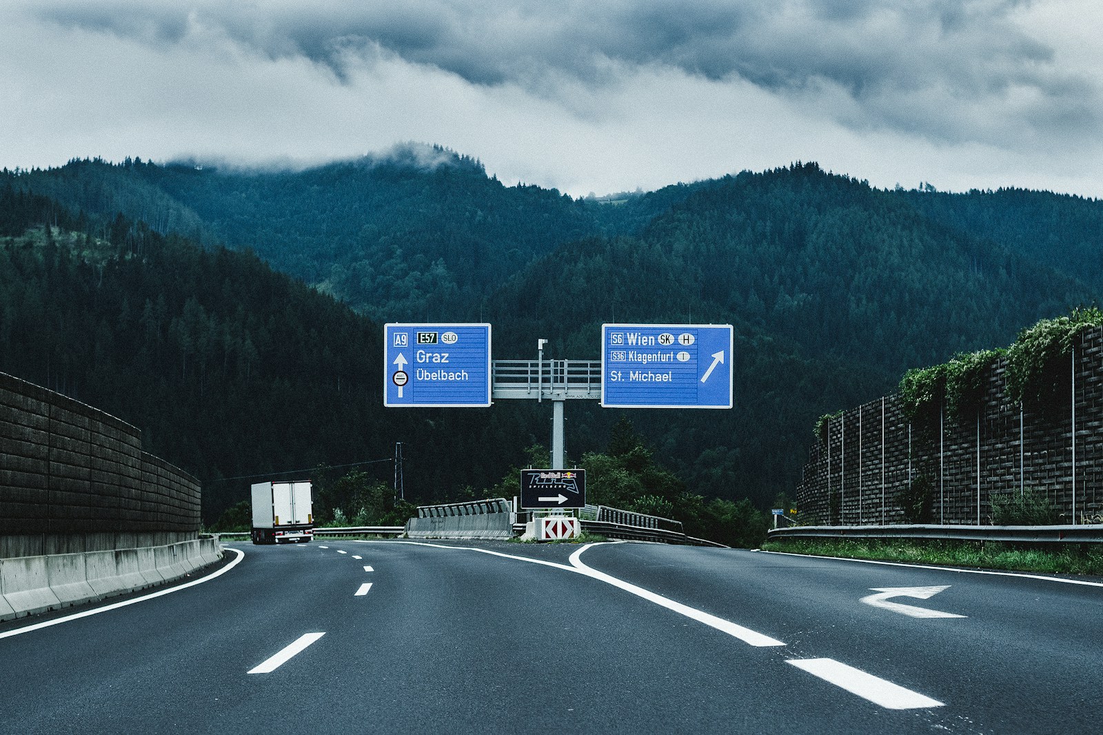 blue and white road sign
